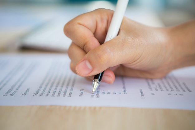 hand-with-pen-writing-paper_1232-615.jpg